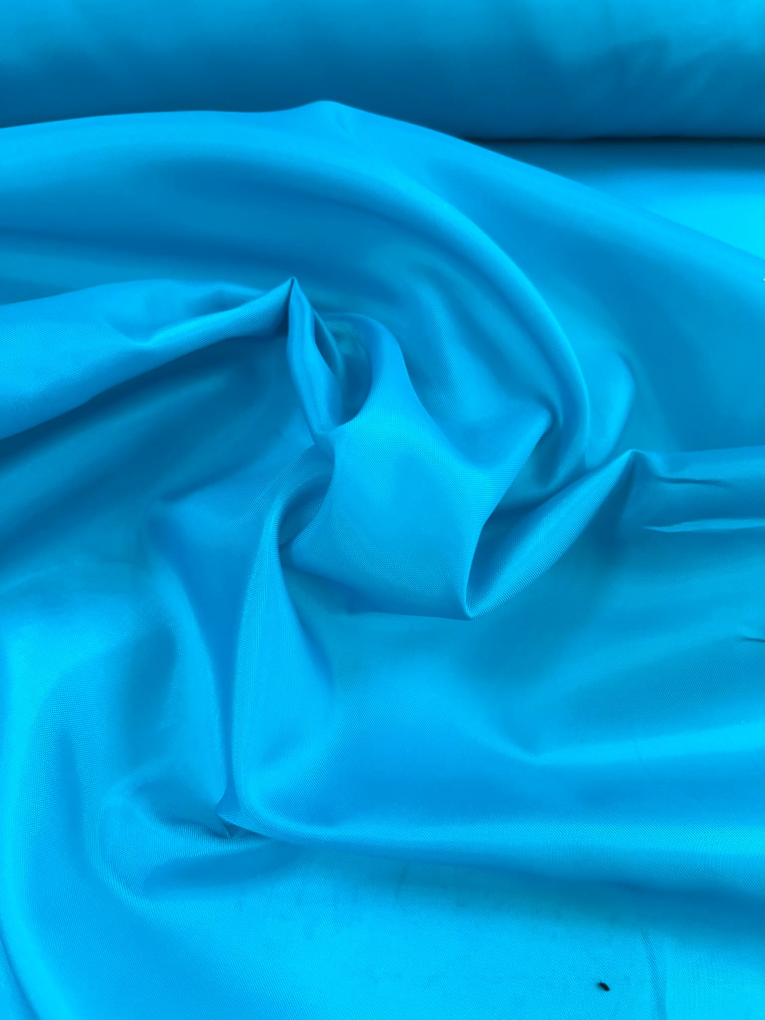 Forro azul acetato - detalle satinado