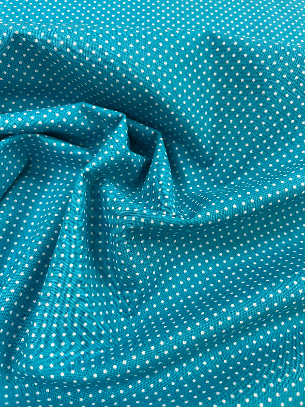 Algodón topitos azul turquesa - detalle caída