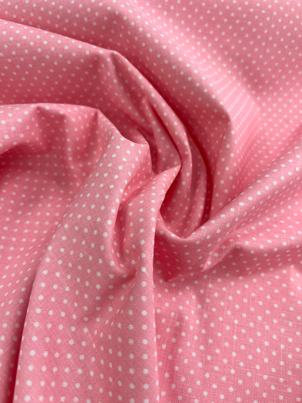 Algodón topitos rosa - detalle caída y estampado