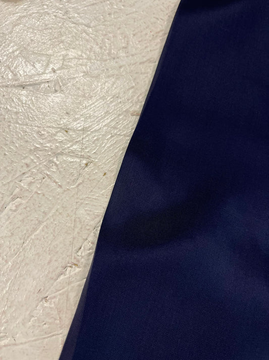 Forro azul marino acetato - orillo y detalle