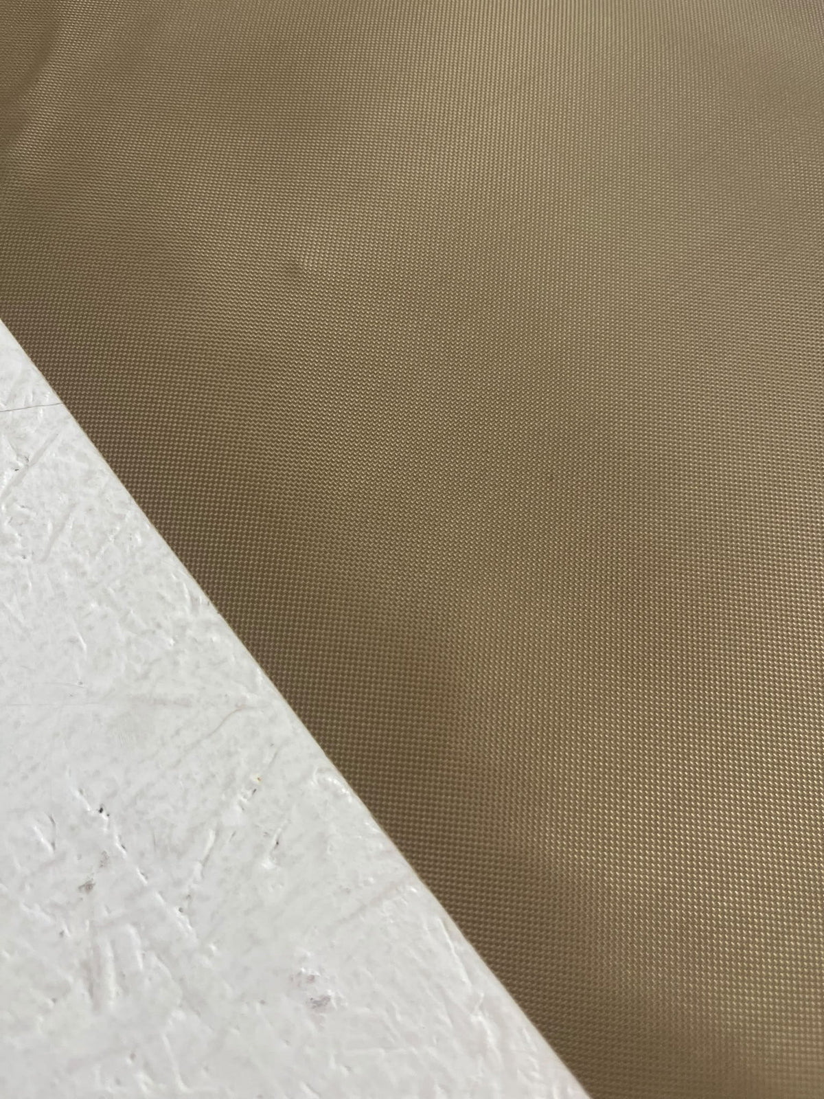 Impermeable beige - detalle textura oxford