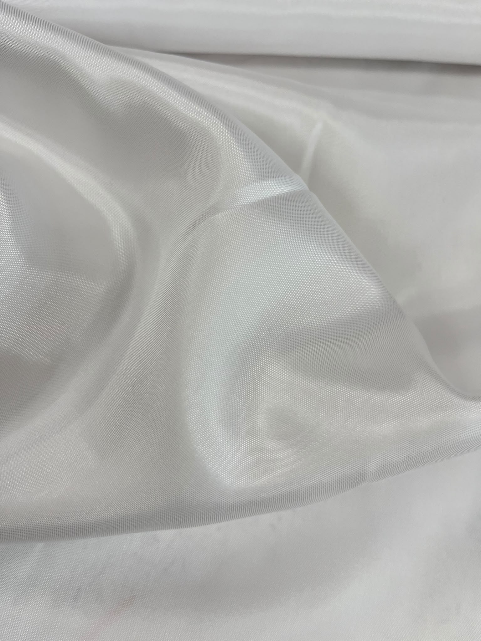 Forro blanco acetato - detalle caída y brillo nacarado