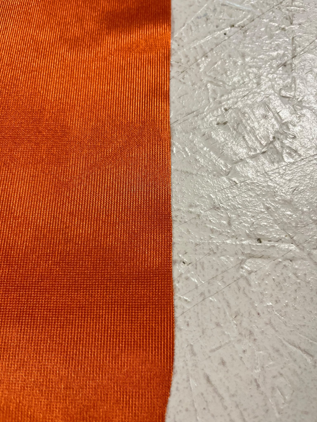Rasete Naranja Tostado - detalle textura y caída del tejido