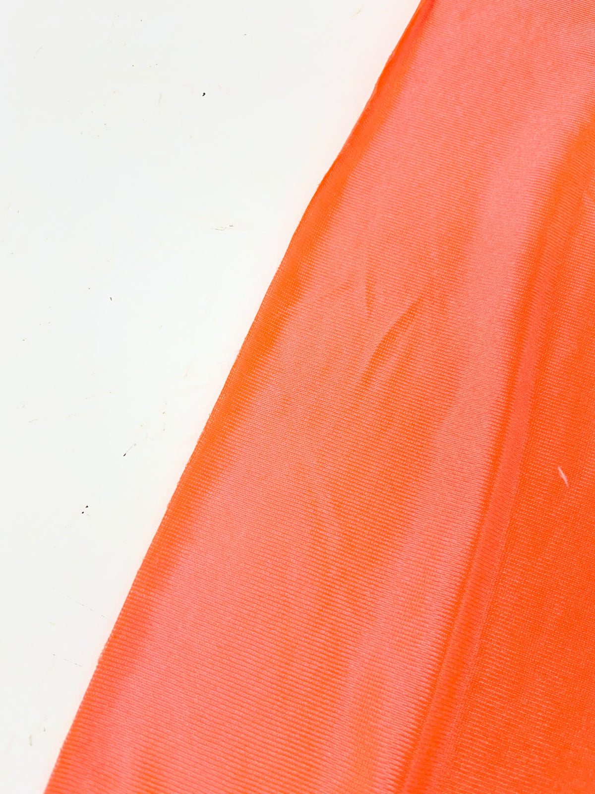 Rasete Naranja Coral - detalle textura y caída del tejido